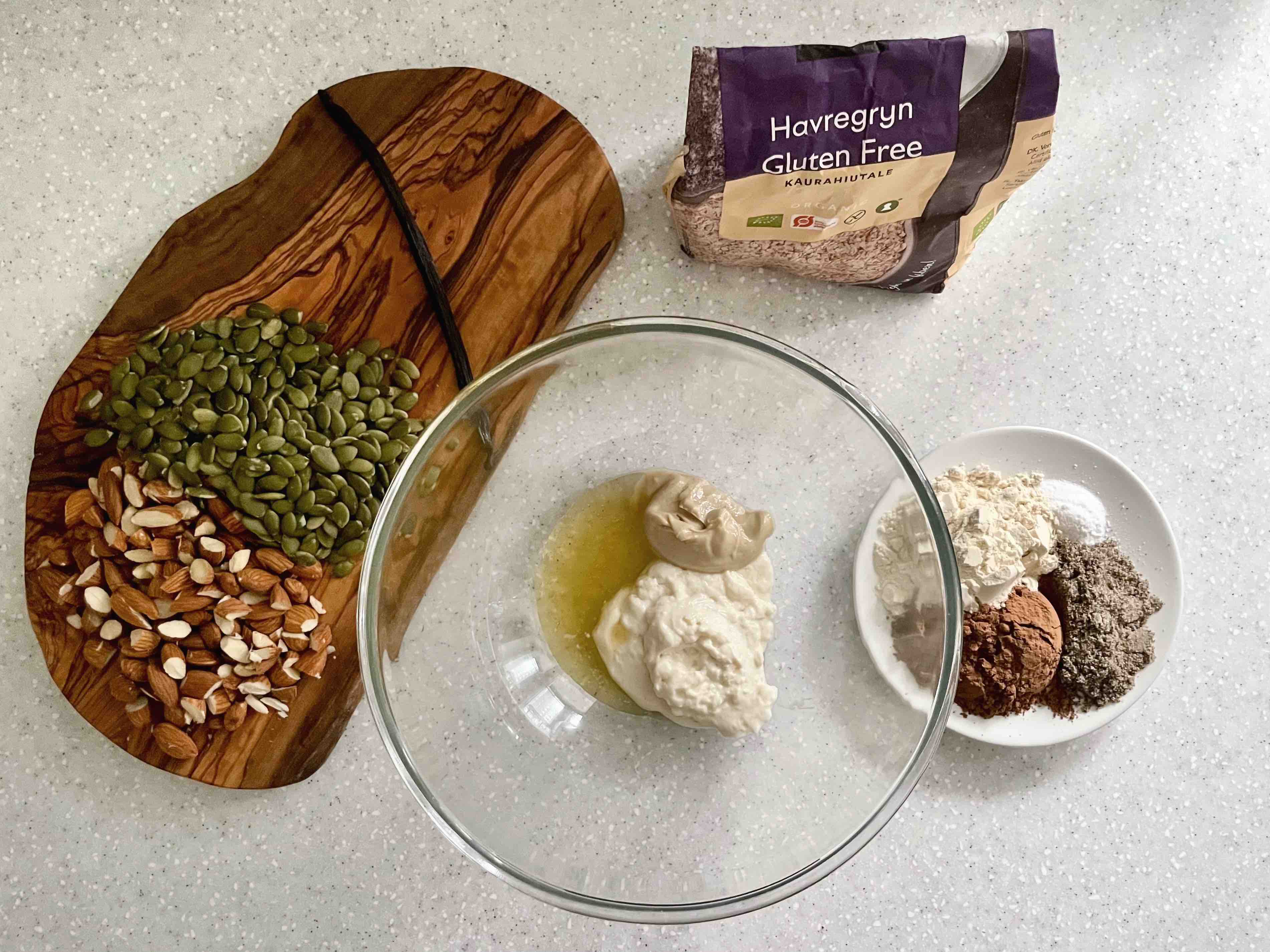 liquid and dry ingredients and chopped nuts before mixing together